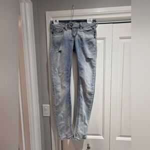 Silver Distressed Skinny Jeans